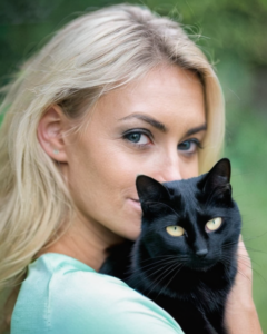 6 - blonde woman and black cat